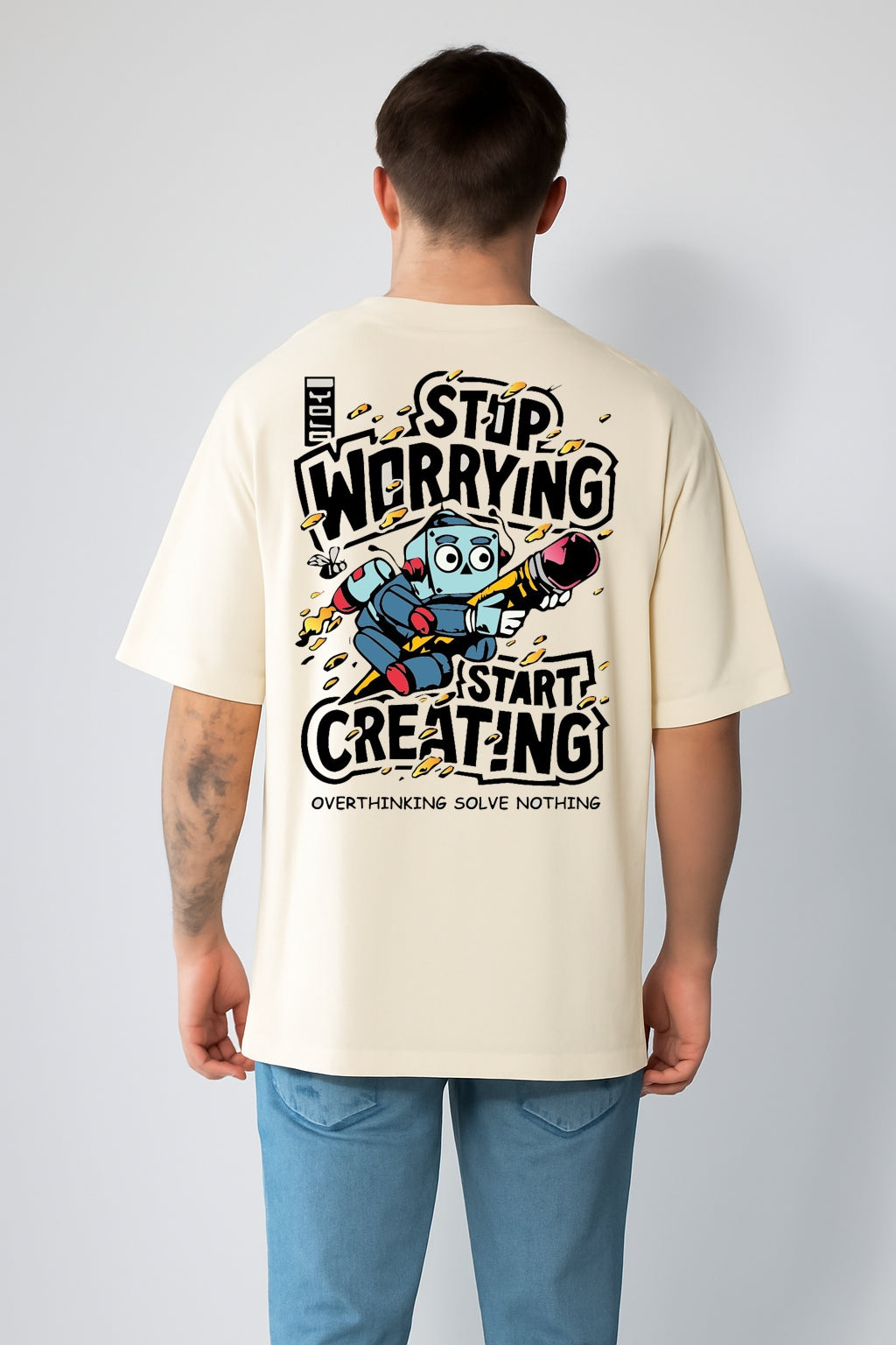 Streetwear Oversized Tees – Stop Worrying Start Creating (Cream)